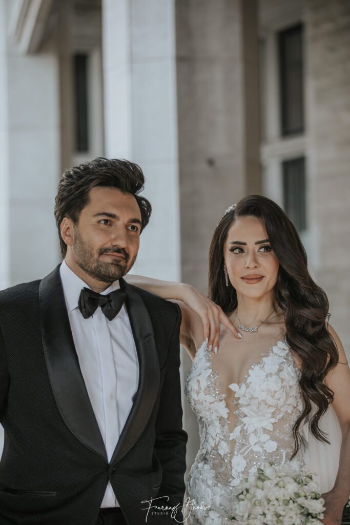 A man and woman posing for the camera.